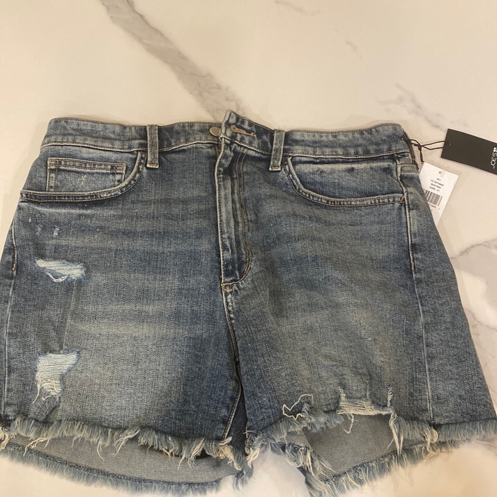 How much Joe’s jeans. Jean shorts. Size 31 waist. Vintage easy short by Joe’s